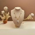 Pearl and gold color charms