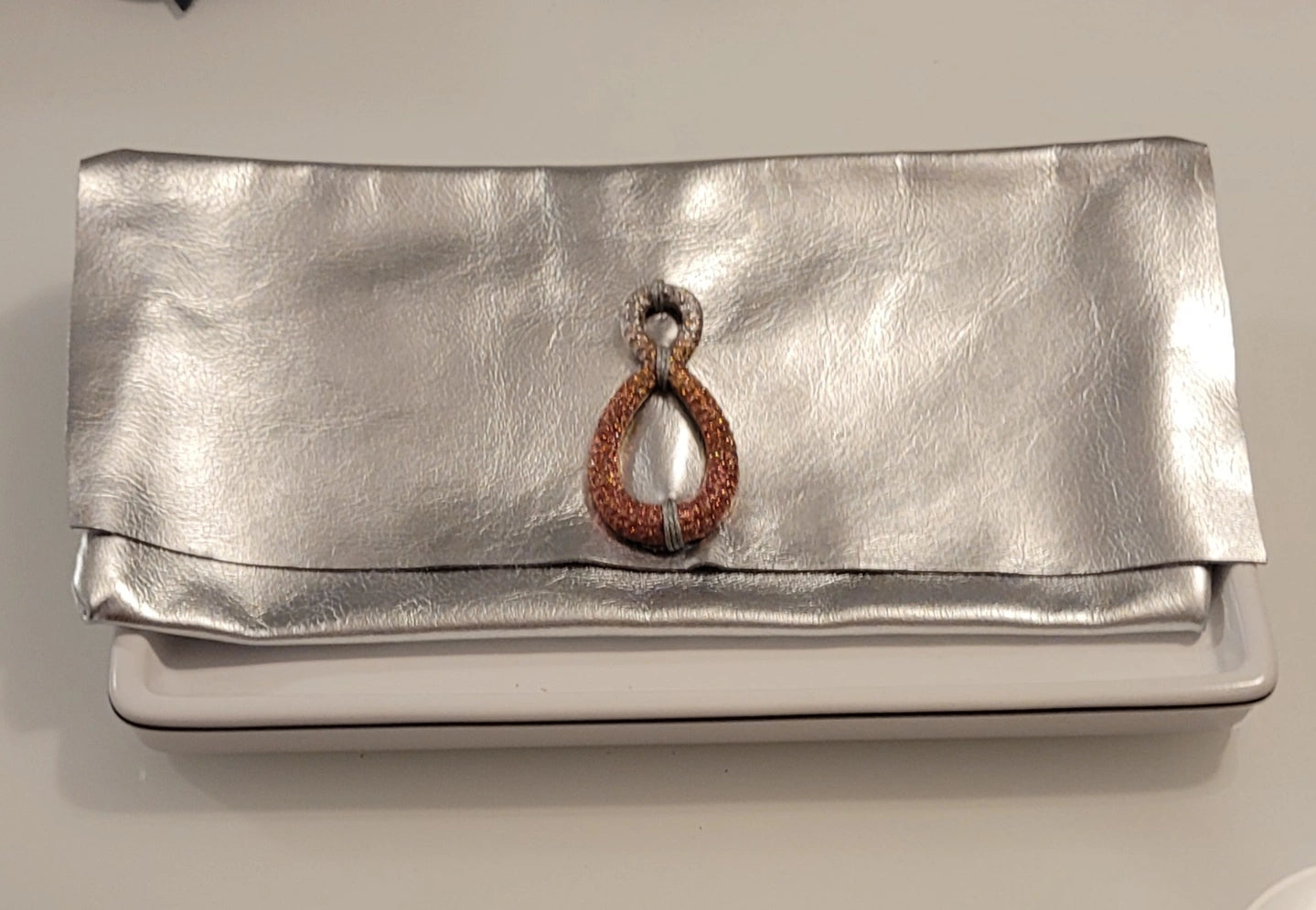 Leather silver metallic clutch